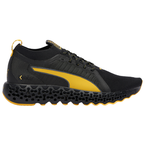yellow and black running shoes