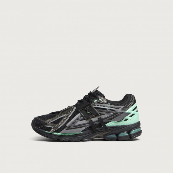 New Balance Men's 1906A Sneaker in Black/Bright Mint - U19063Y0