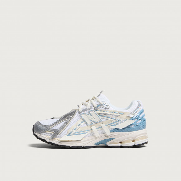 New Balance Men's 1906A Sneaker in Sea Salt/Altitude Metallic - U19065IC